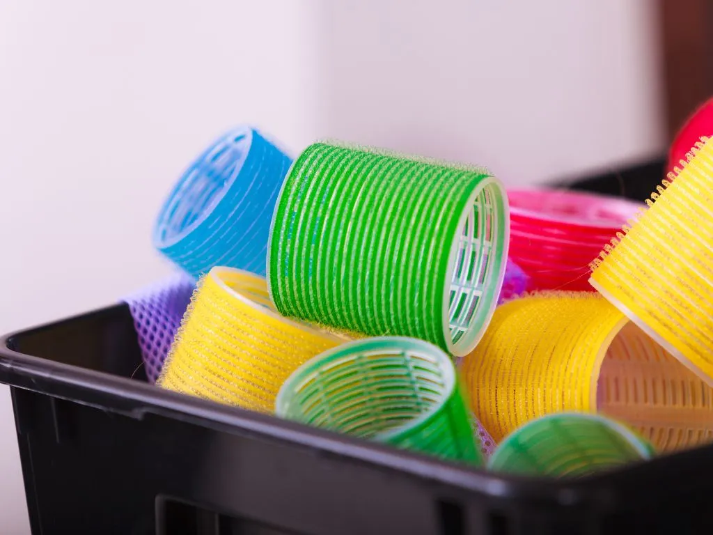 Using a velcro hair curler as a trick for getting dog hair out of car carpet