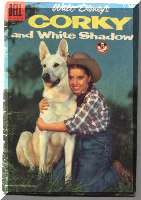 White Shadow, a German Shepherd, with Corky in a classic scene from the Walt Disney Mickey Mouse Club TV series.