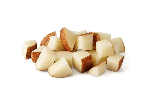 Whole, raw potatoes, representing easily digestible carbohydrates for dogs with food sensitivities.
