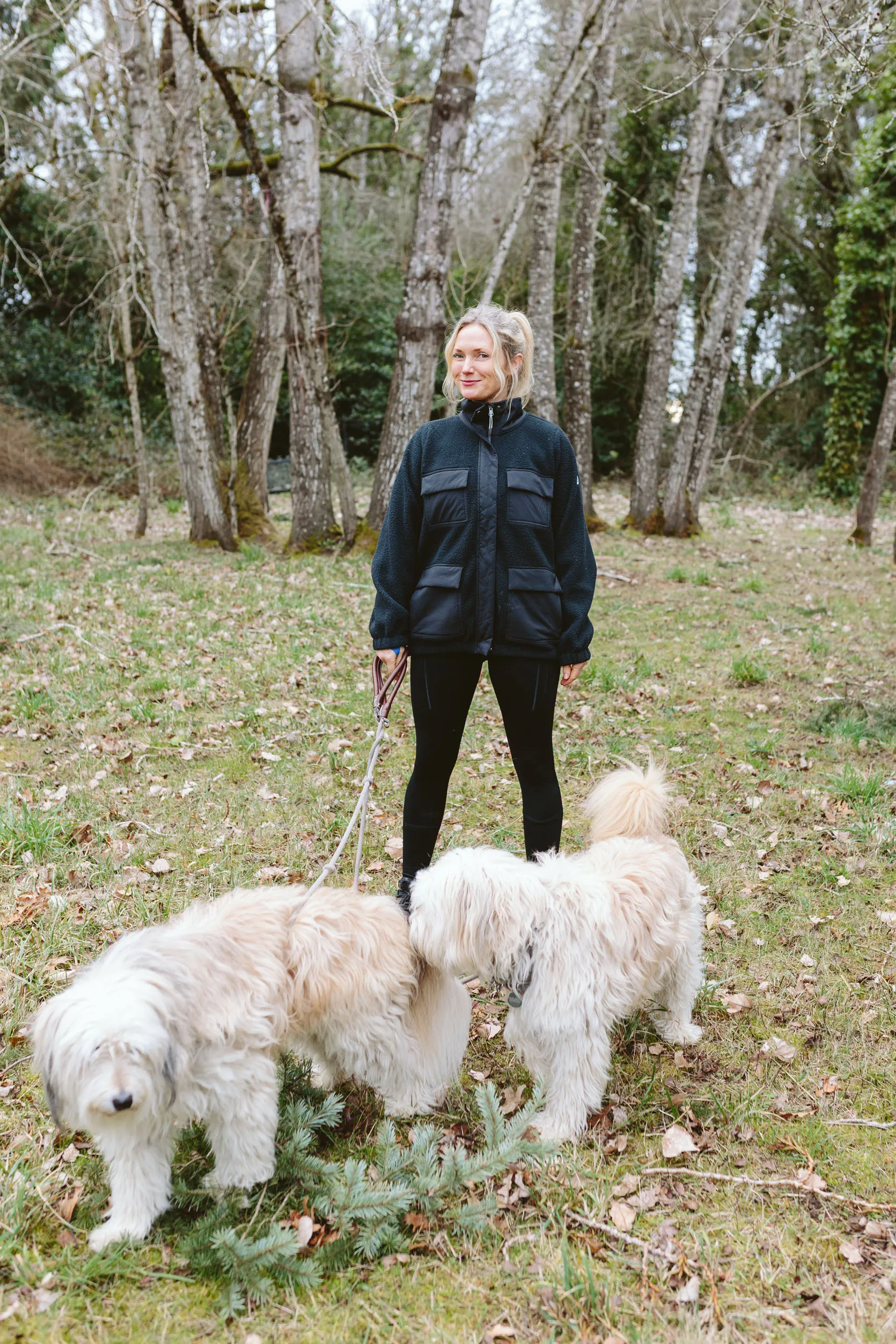 Woman in an oversized, cozy fleece jacket, ideal for layering or milder cold.