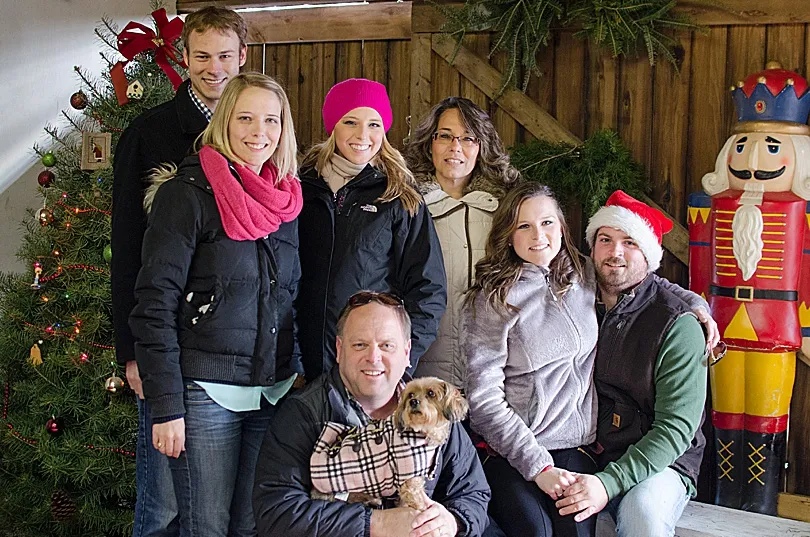 Yorkiepoo, Sophie, wearing a festive collar, ready for Christmas celebrations and family gatherings.