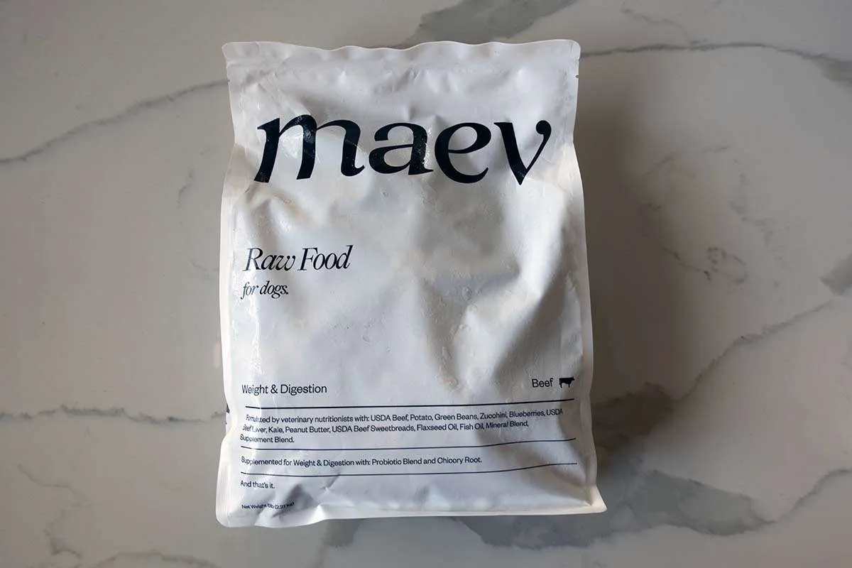A bag of Maev raw dog food, featuring their distinctive packaging.