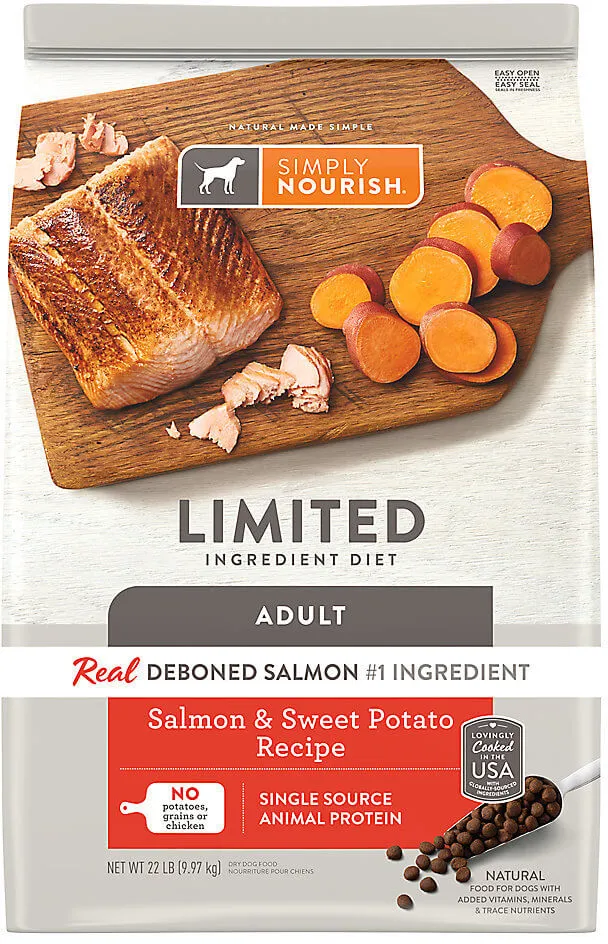 A bag of Simply Nourish Limited Ingredient Salmon & Sweet Potato dry dog food with kibble spilled