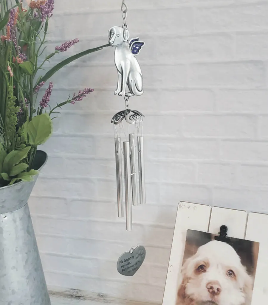 A beautifully crafted pet memorial wind chime, with custom elements to honor a lost dog