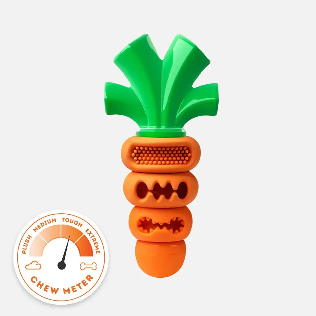 A bright orange rubber carrot-shaped dog toy, designed for chewing and dental health.