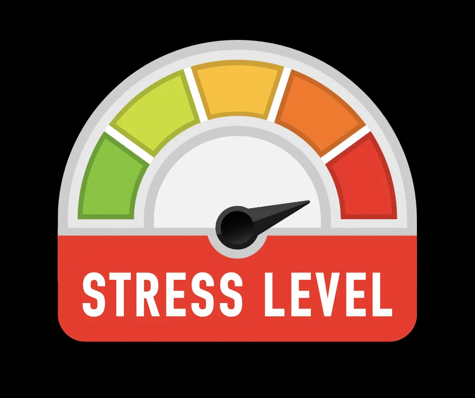 A close-up of a dog's face peering out from behind the bars of a metal crate, looking anxious