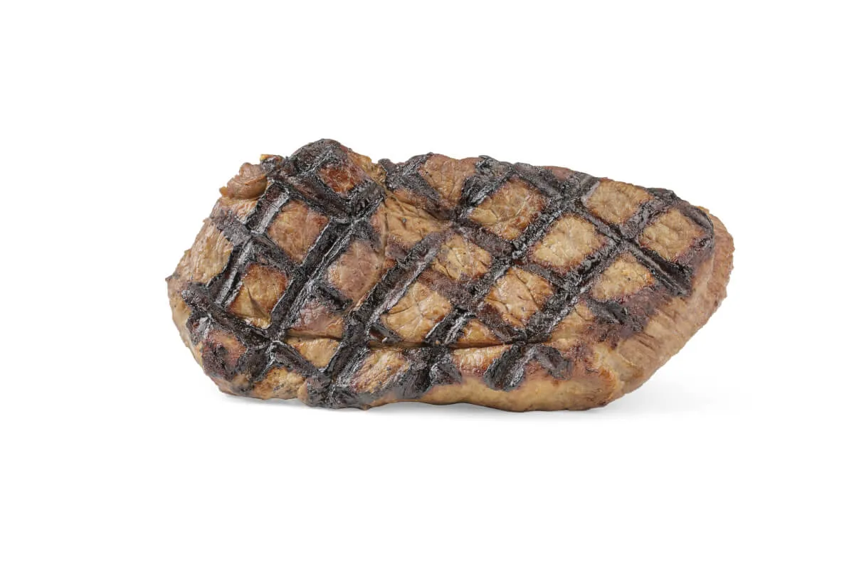 A close-up of tender, cooked lamb pieces, suitable for canine consumption