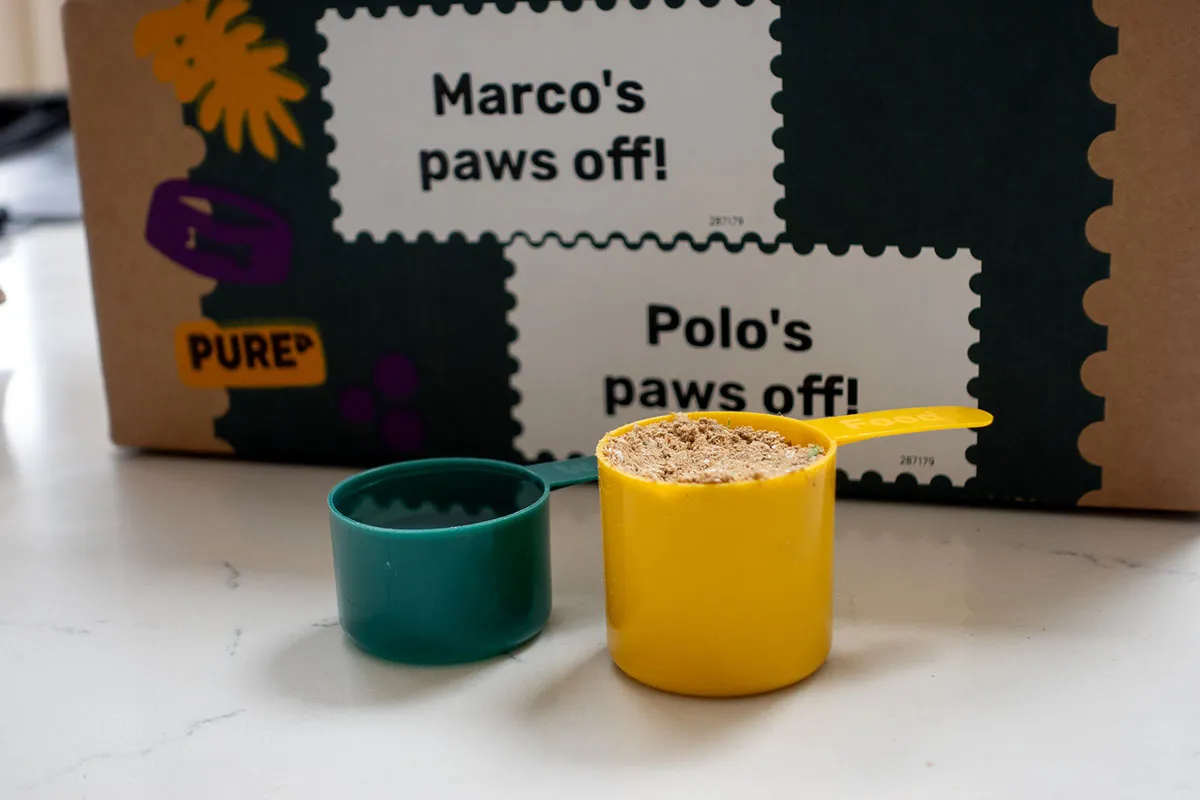 A close-up shot of Pure Pet Food, showcasing its air-dried kibble texture.