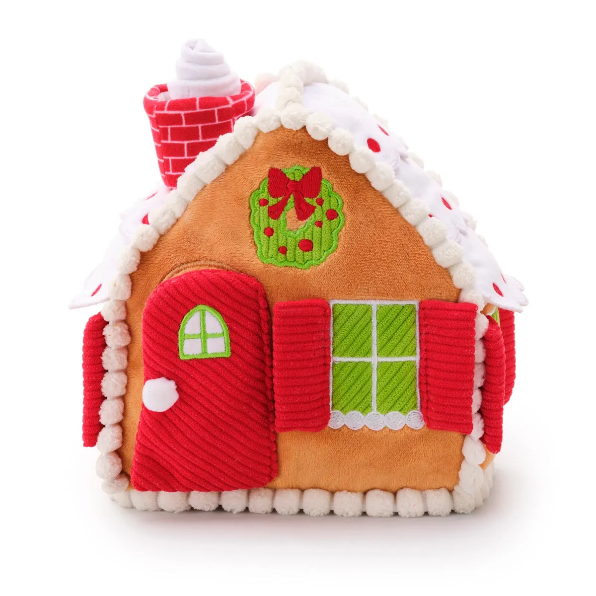 A cute plush gingerbread house dog toy, perfect for festive playtime during the holidays