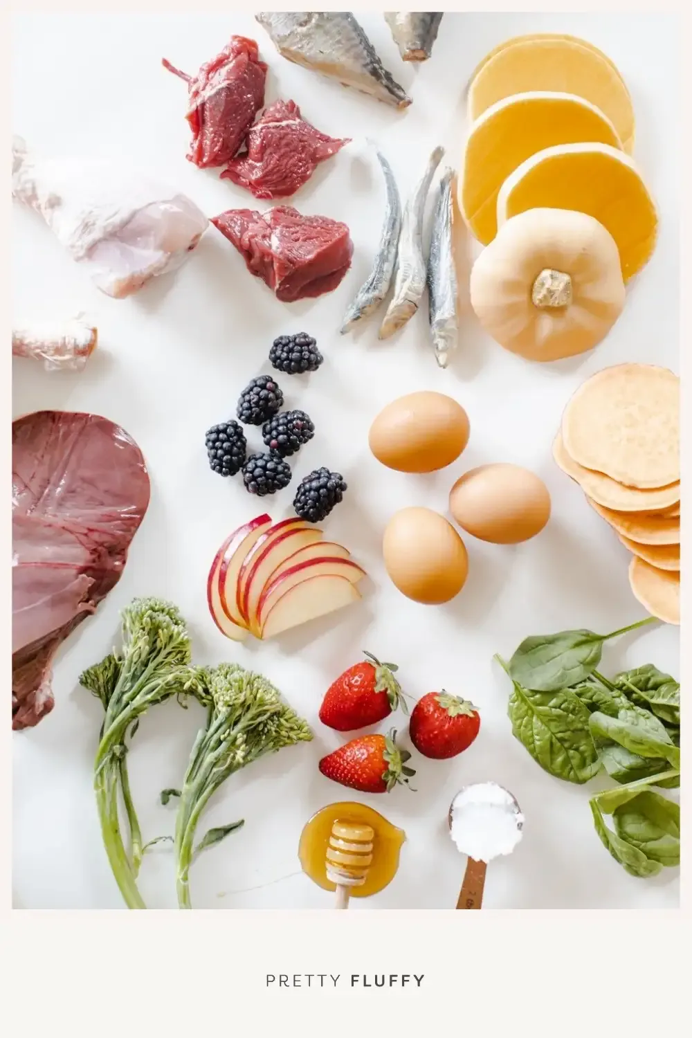 A happy dog curiously observing a display of fresh raw food ingredients