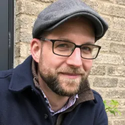 A professional headshot of James D. Witmer, the author of children's books