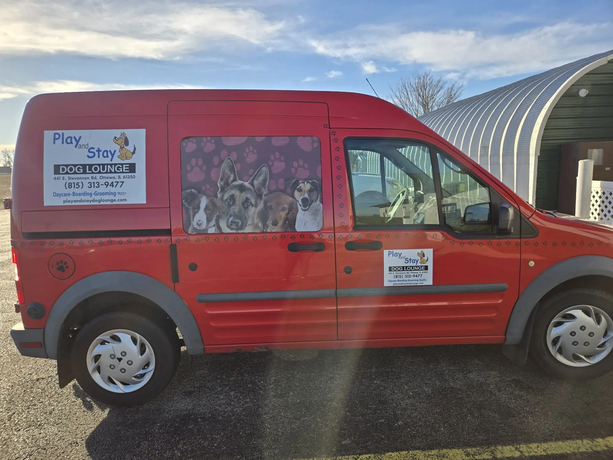 A professional van offering convenient pet pick-up and drop-off services