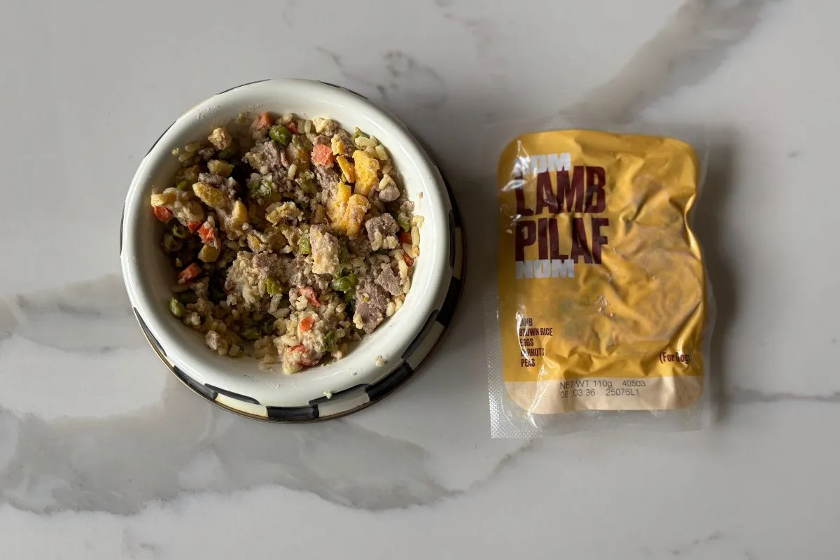 A serving of Nom Nom Lamb Pilaf fresh dog food in a bowl