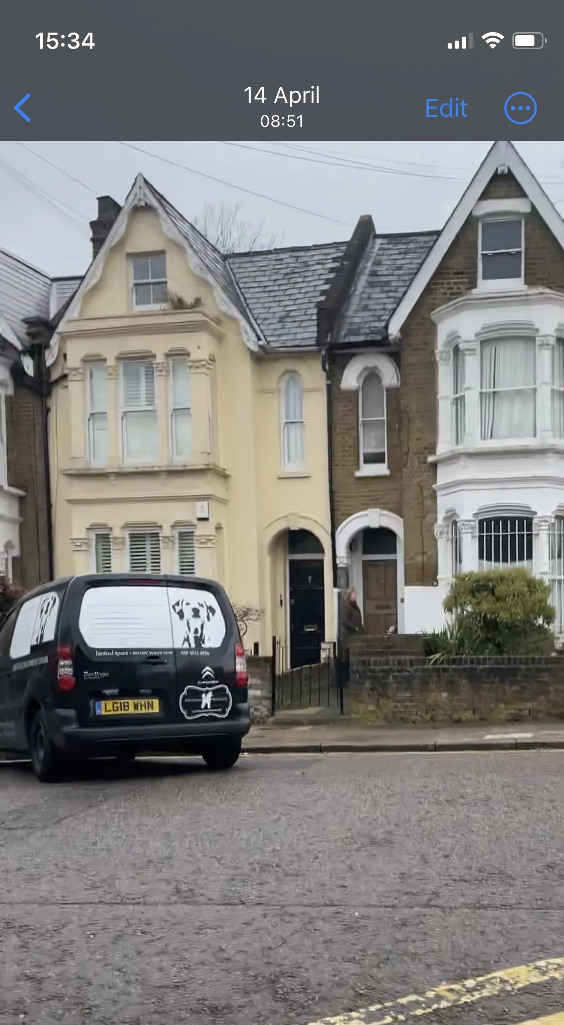 A staff member of The London Dog Walking Company taking Frankie the Whippet to Natasha's council house for an unlicensed daycare service