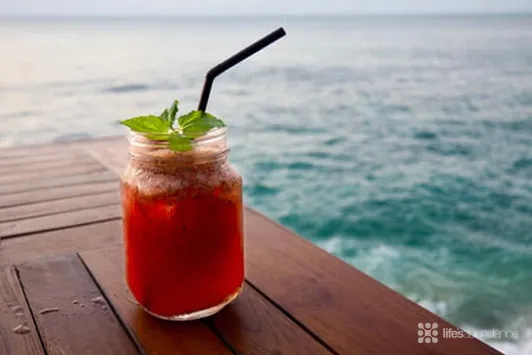 A tropical drink on a table, symbolizing refreshment and overall well-being in a healthy lifestyle