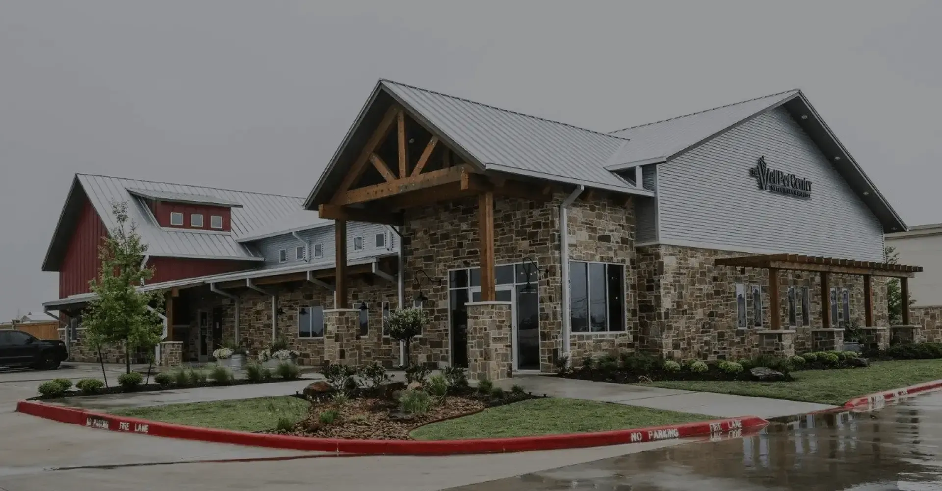 A welcoming exterior view of a modern veterinary hospital, ready to greet pets and their owners.