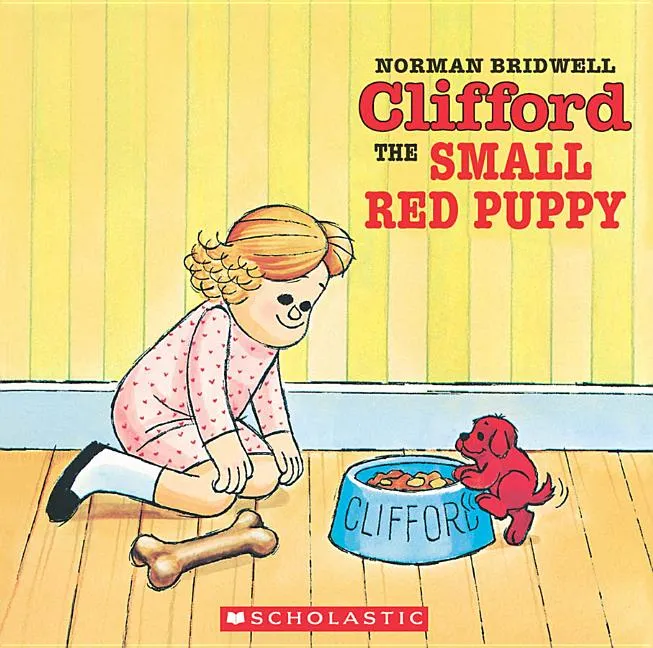 A young, small red puppy, who is Clifford, in an early illustration before he grew to his famous size.