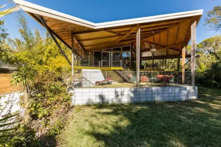 Another exterior perspective of a Bird Cage House