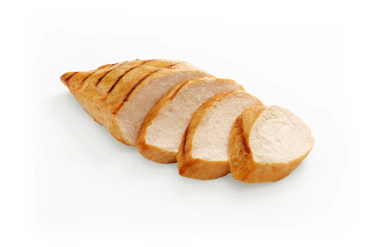 Close-up of fresh chicken, a key ingredient for muscle development in dog food