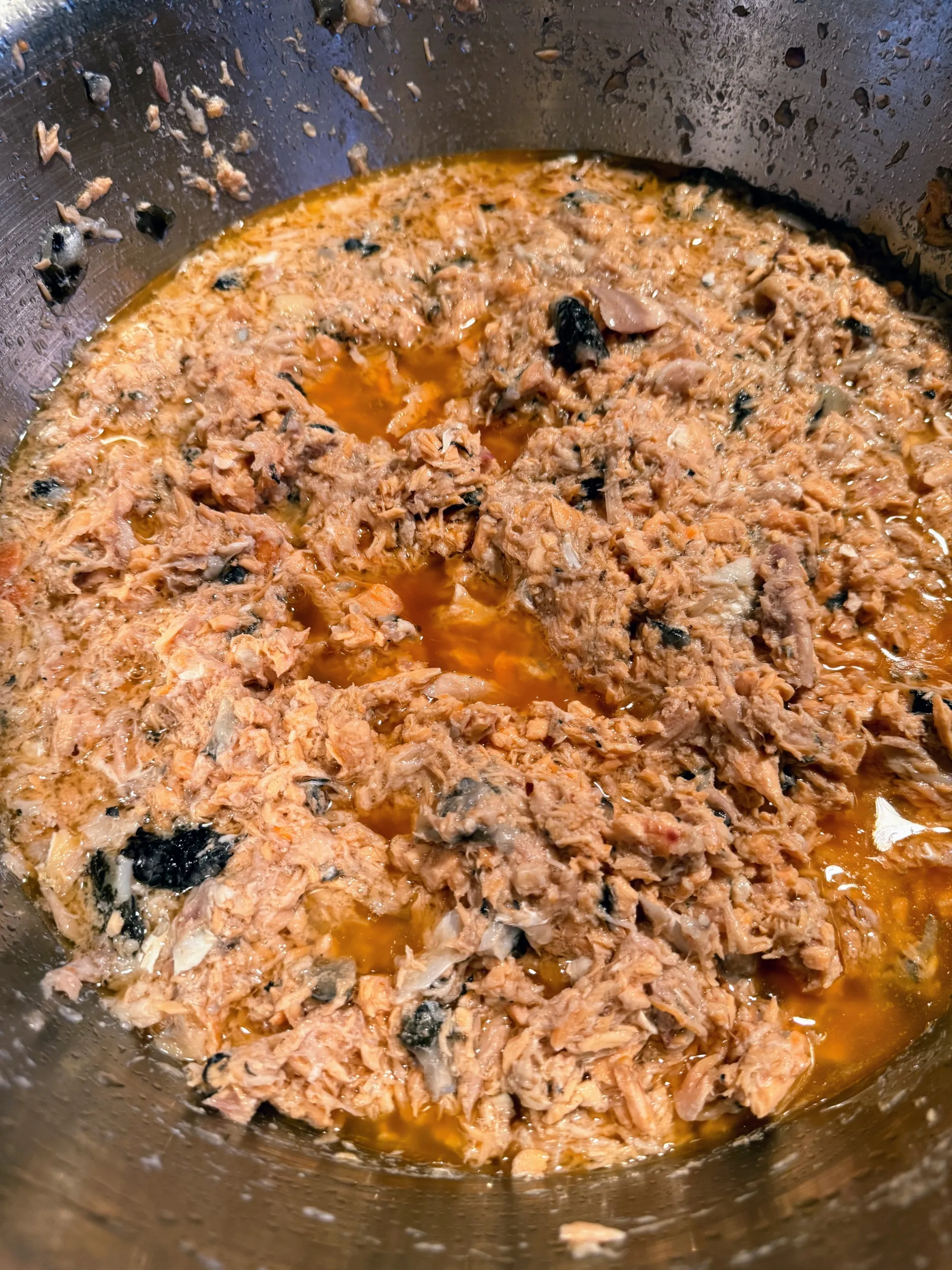 Cooked salmon, carefully checked for bones, ready to be added to the homemade dog food.