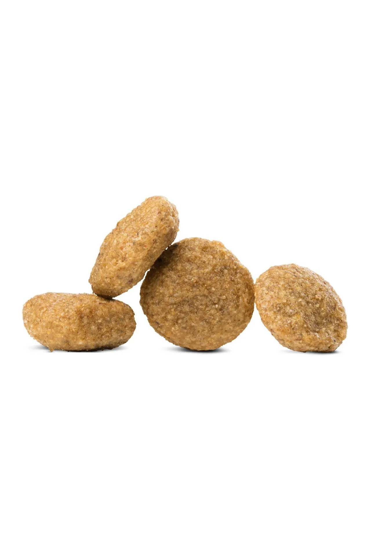Crispy, round, brownish dry dog food kibble, loosely piled and appearing appetizing.