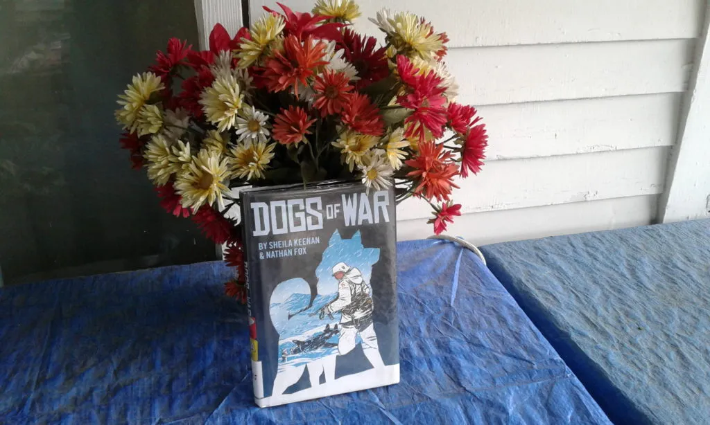 Dogs of War graphic novel cover showing heroic military dogs in action