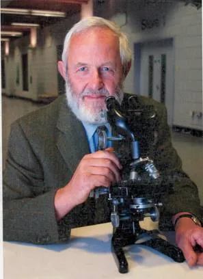 Dr. John R. Baker, B.V.Sc Ph.D, avian veterinarian specializing in budgerigars