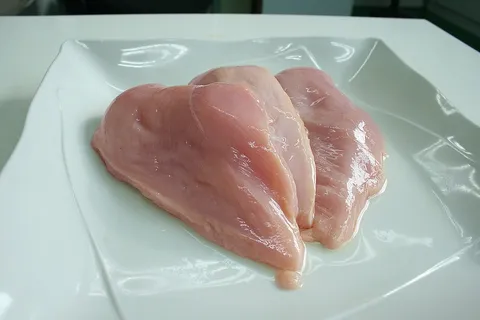 Fresh chicken breast, often used in bland diets for dogs