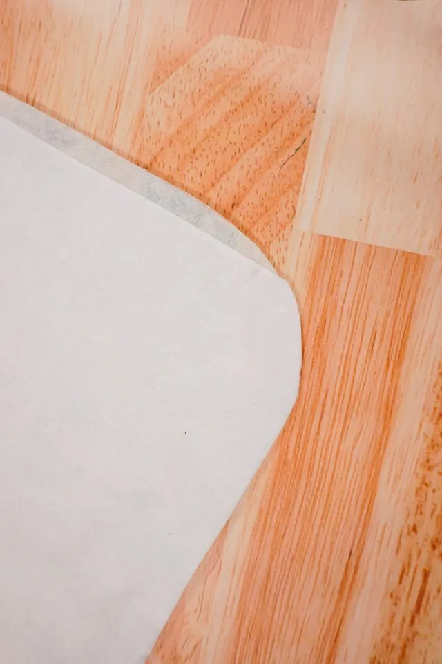 Fusing layers of fabric, interfacing, and fleece together with an iron