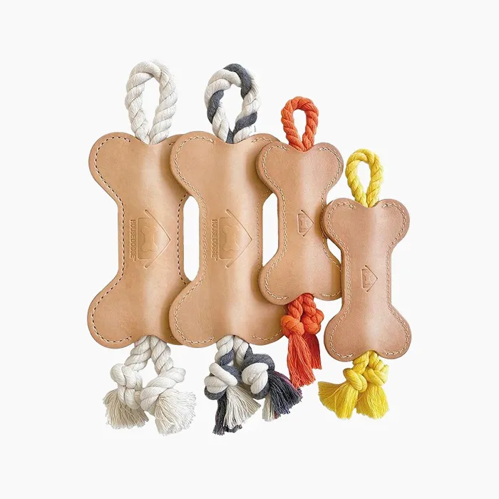 House Dogge vegetable-tanned leather tug toy in a natural blonde color