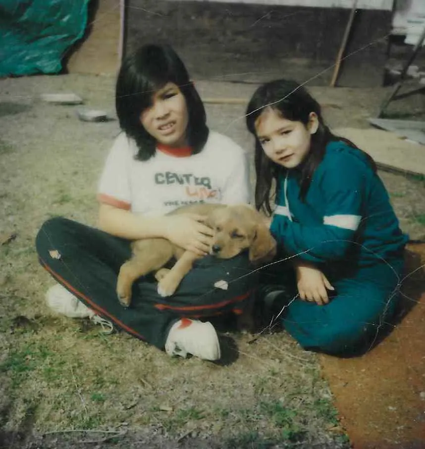 Jennifer Li Shotz with her brother Geoff and their dog, Mork, a personal connection to her dog stories.