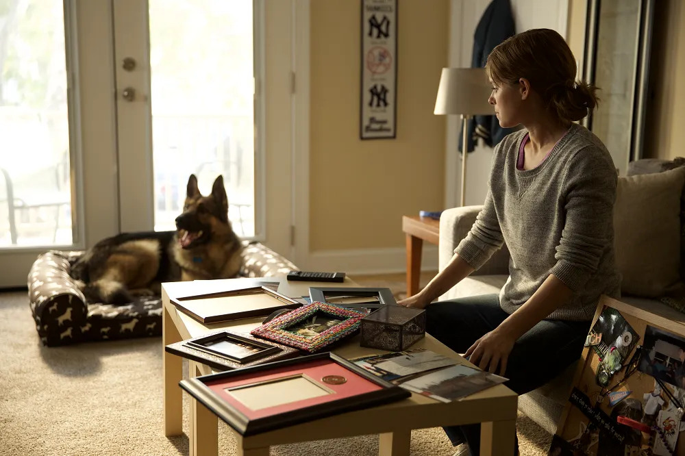 Kate Mara and Rex in the movie REX