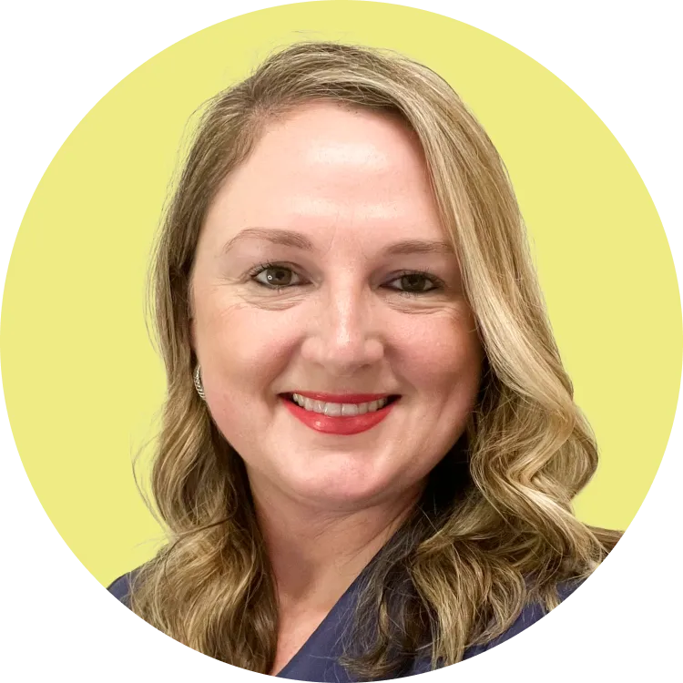 Kitten curiously approaching a clean litter box setup in a quiet home corner
