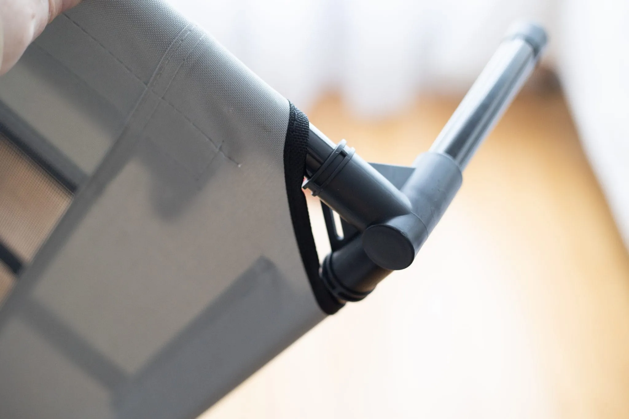 Measuring the generous dimensions of a large elevated dog bed, ideal for various dog breeds.