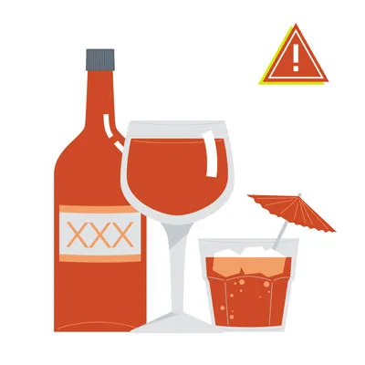 Open bottle of alcoholic beverage next to a glass