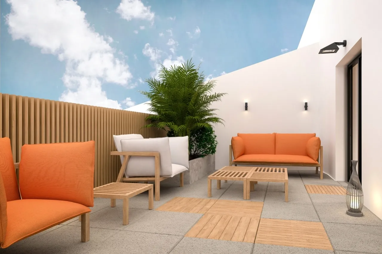 Outdoor patio furniture, including a table and chairs, with a bird on a chair, highlighting the issue of birds on furniture.