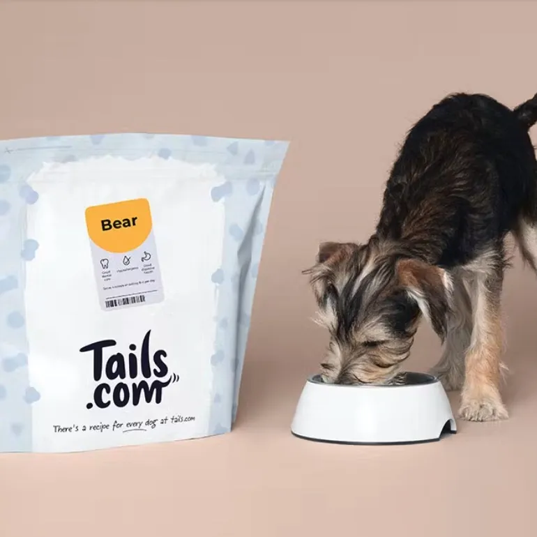 Puppy with tails.com dog food
