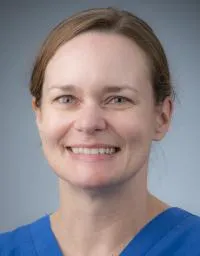 Rebecca Arnold, DVM, Chief of Service, a faculty veterinarian supervising pet surgeries.