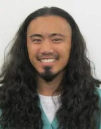 Rodney Santos, RVT, Supervisor, an experienced veterinary technician overseeing surgical support.