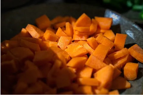 Several ripe, orange pumpkins displayed together