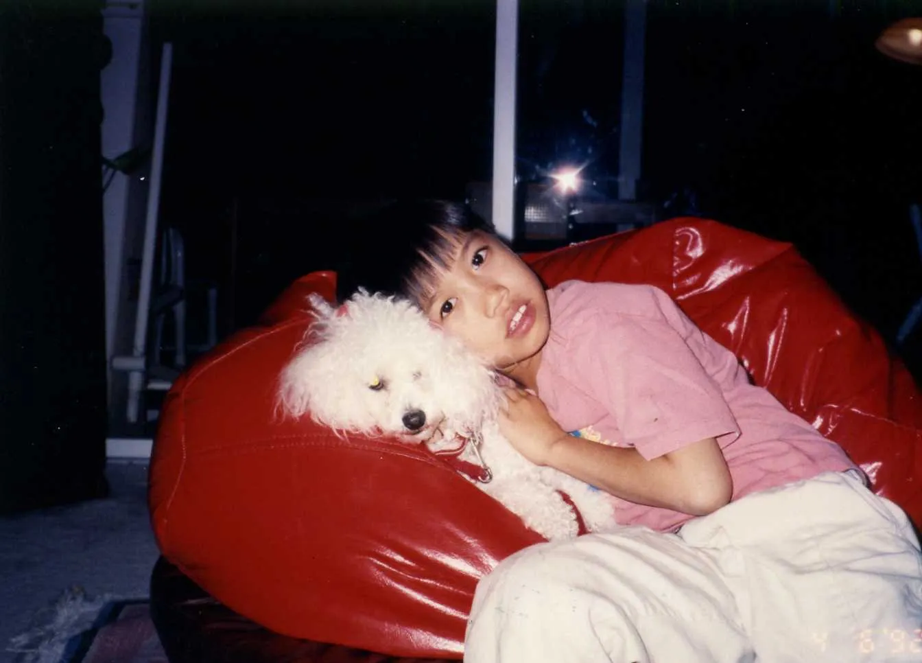 The author, Tao, sharing a tender moment with Binky, highlighting their close bond.
