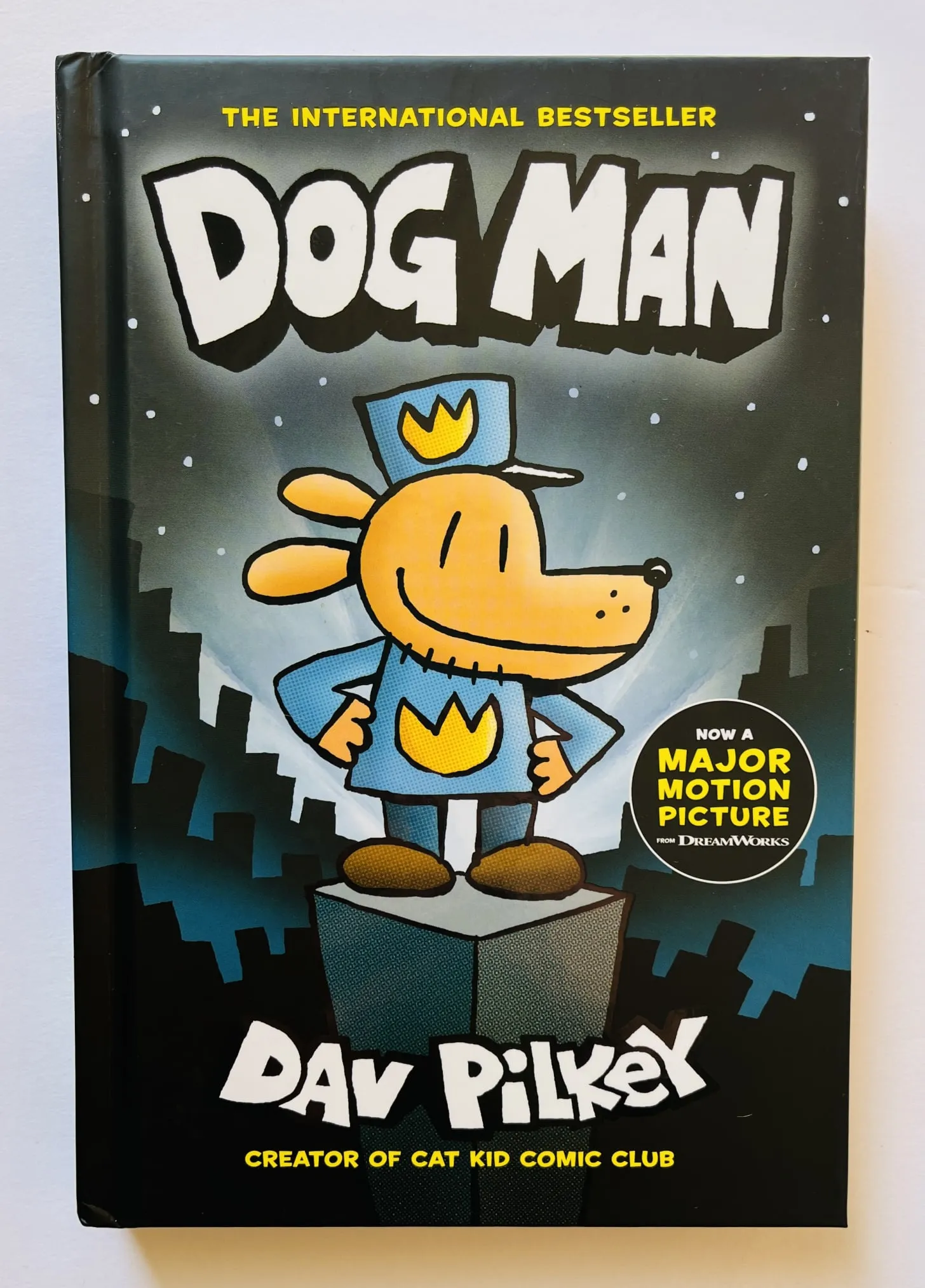 The cover of the first Dog Man book, titled simply Dog Man, by Dav Pilkey, featuring the half-dog, half-man hero