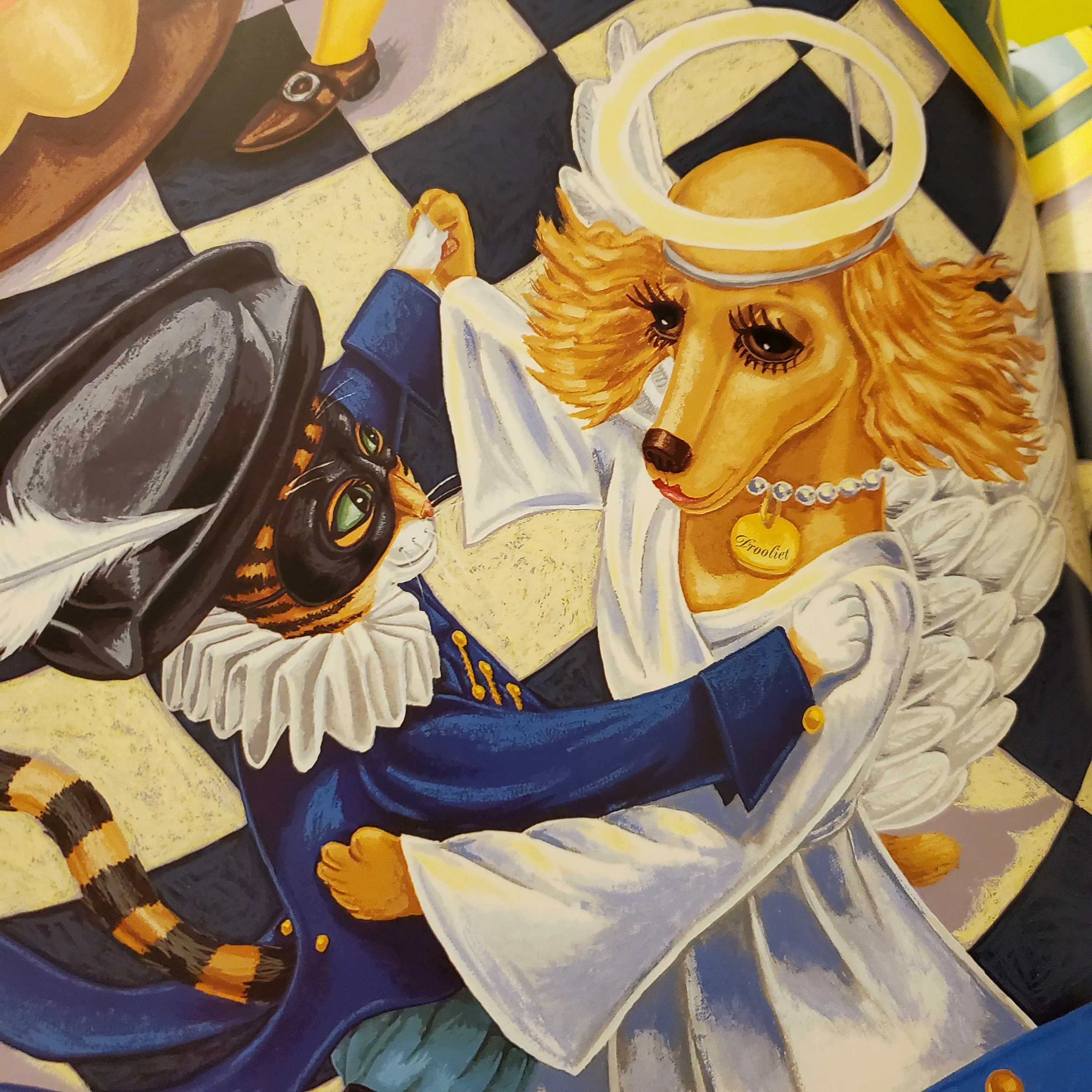 The enchanting book cover of "Romeow and Drooliet" featuring a cat and a dog