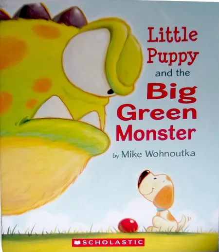 The enchanting cover of "Little Puppy and the Big Green Monster" by Mike Wohnoutka
