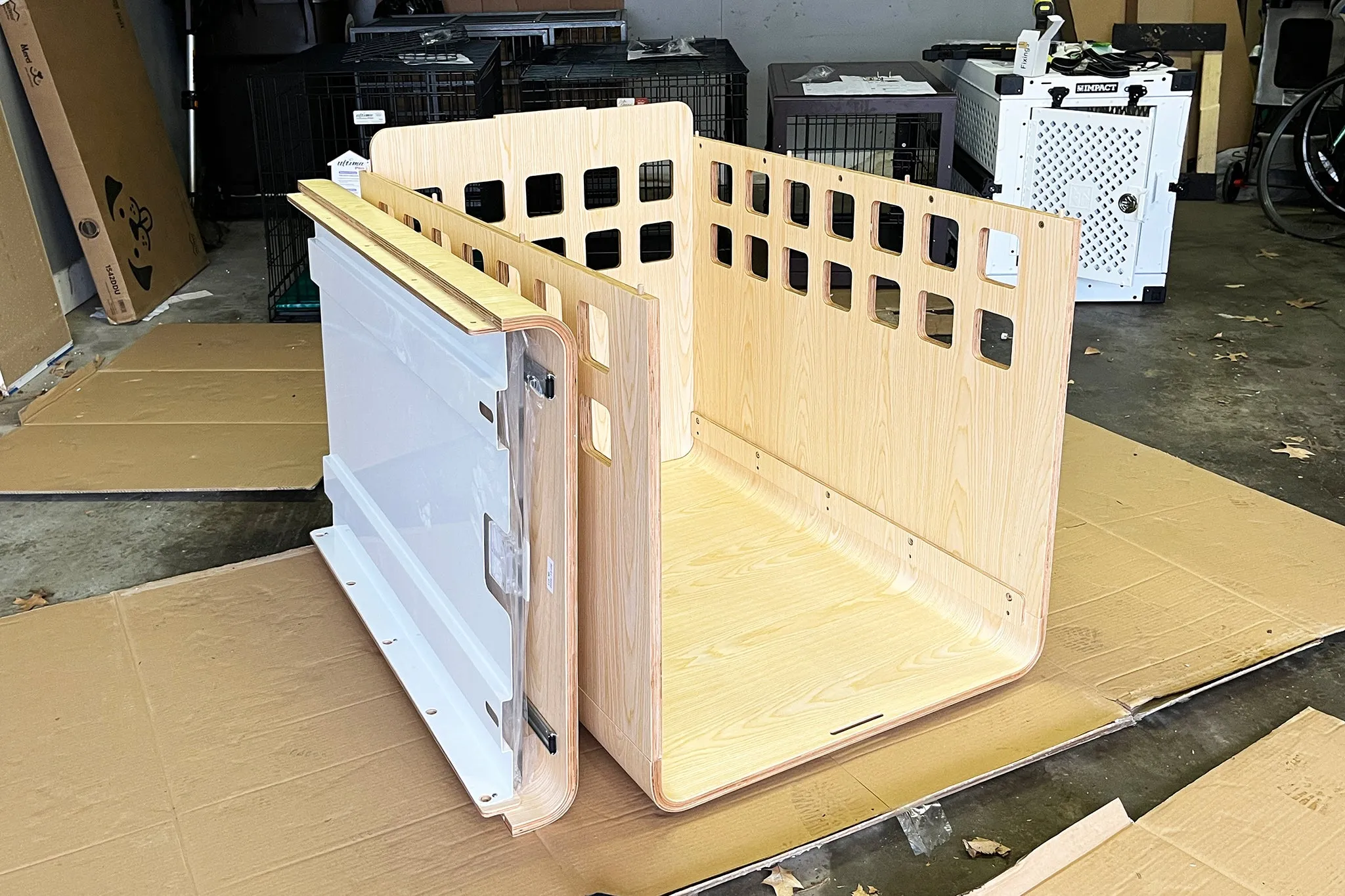 The Fable dog crate, shown during the set up stage without its roof or door installed.