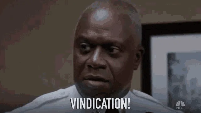 Triumphant dog looking up, signaling successful training