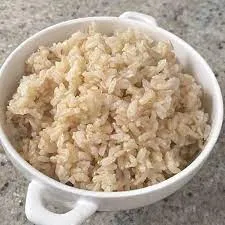 Uncooked brown rice grains