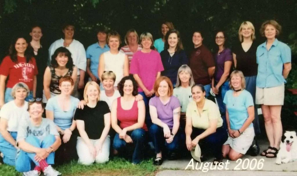 Vintage photo of dog trainers, consultants, and volunteers from 2006