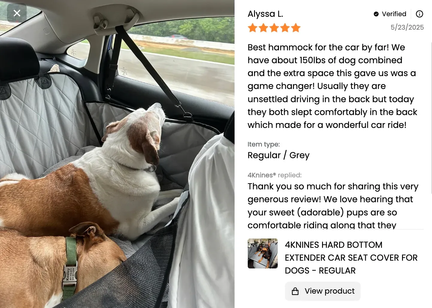 A dog resting comfortably on a 4Knines seat cover during a car ride