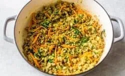 Adding vegetables to ground turkey mixture